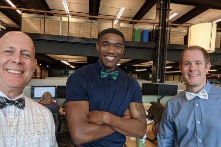 Team members celebrate Ryan's annual Bow Tie Day on June 17, in honor of Fran Ryan, one of the founders.