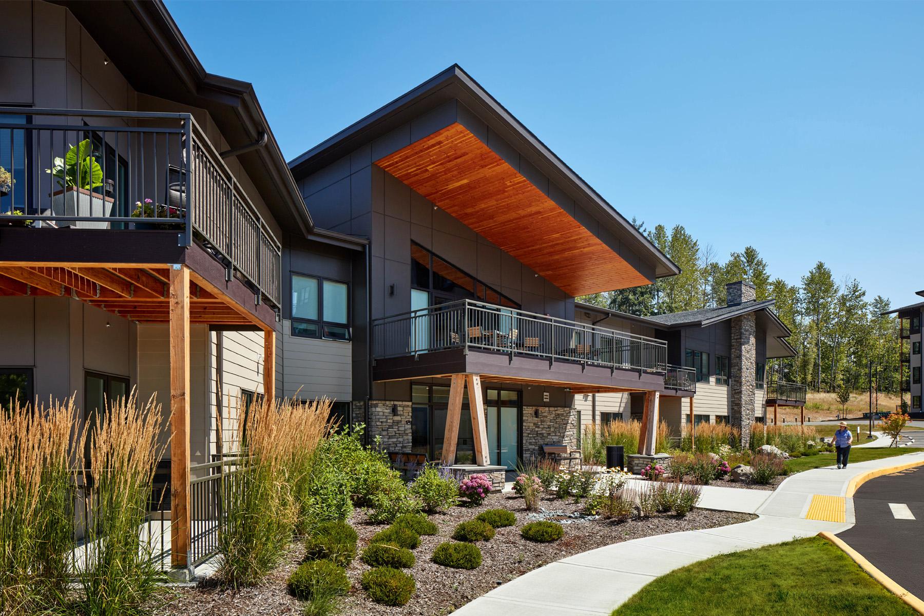 An exterior view of Wesley at Tehaleh, a senior living community located within the master-planned community of Tehaleh by Newland in Bonney Lake, Wash.