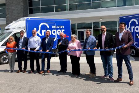 Kroger, Ocado and Ryan representatives celebrate the grand opening with a ribbon cutting