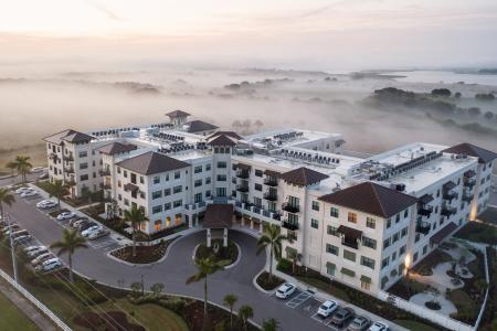 An aerial view of Grand Living at Lakewood Ranch, a senior living community located in Sarasota, Florida. 
